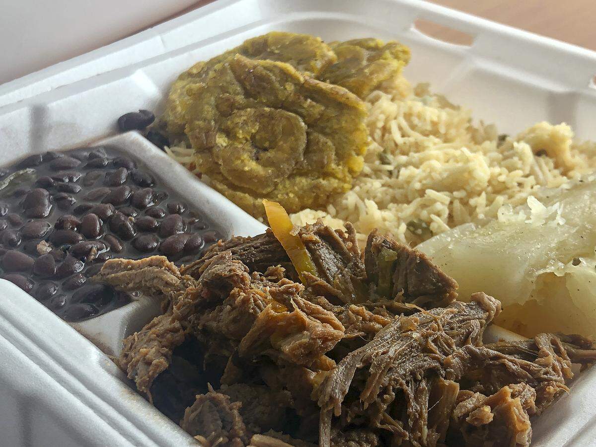 From left, congri, tostones, arroz, yucca con mojo and ropa vieja, all will be served at Havana Cafe in Pasco.