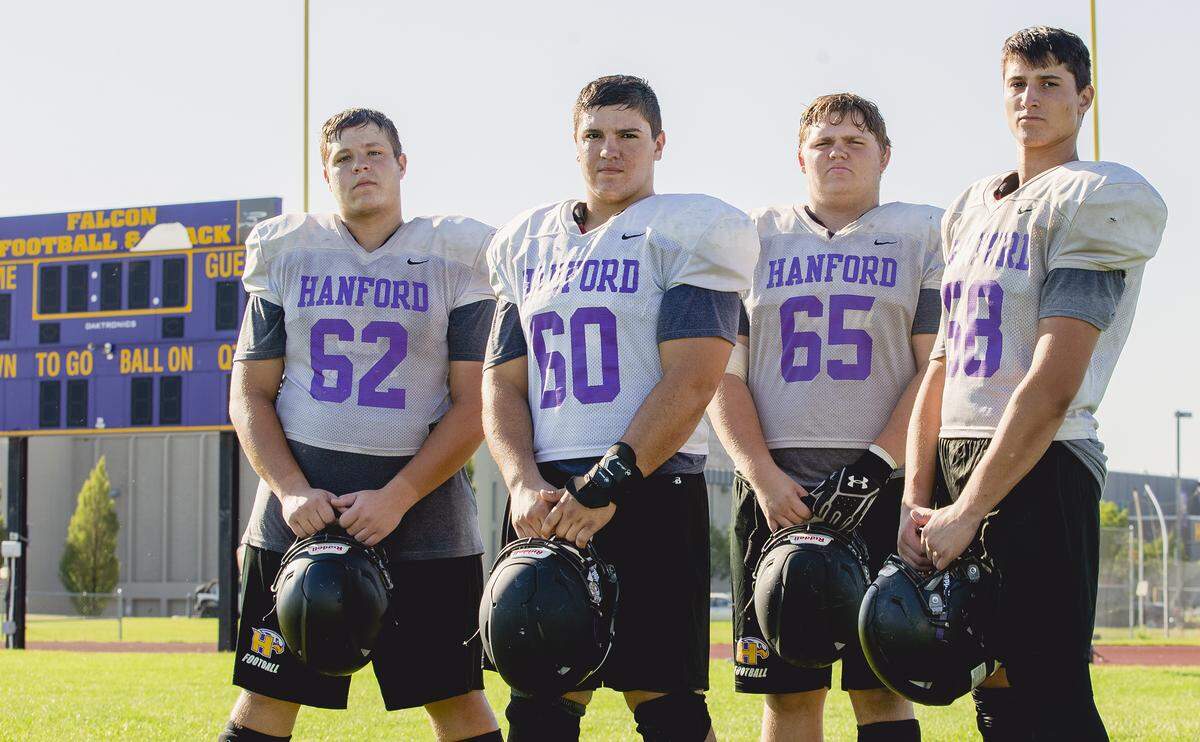 Hanford High’s starters on the Falcons offensive line are Michael Chvedov, left, Casey Moddrell, Wyatt Eller, center, and Payten Collins.