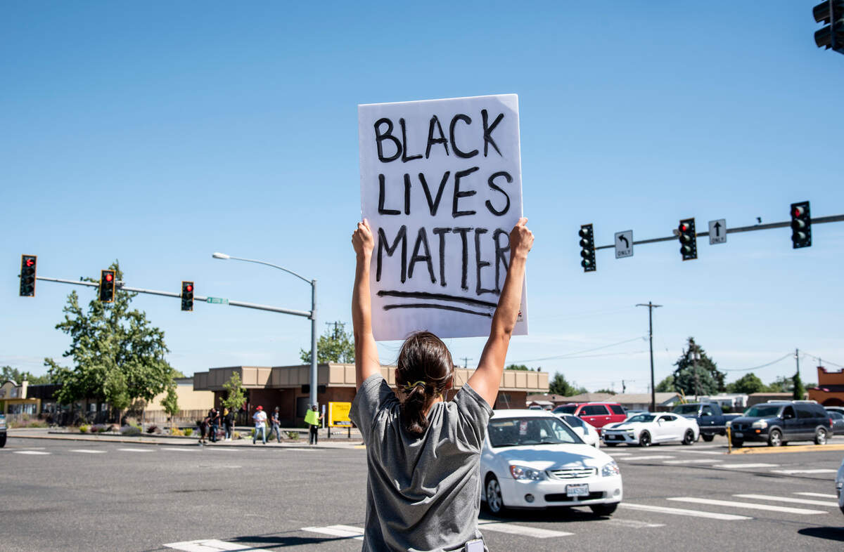 Vanessa Roueche, 25, of Pasco, joined about 250 protesters on Court Street on Sunday. “Police using force illegally to kill our black community is what I’m fighting against,” she said.