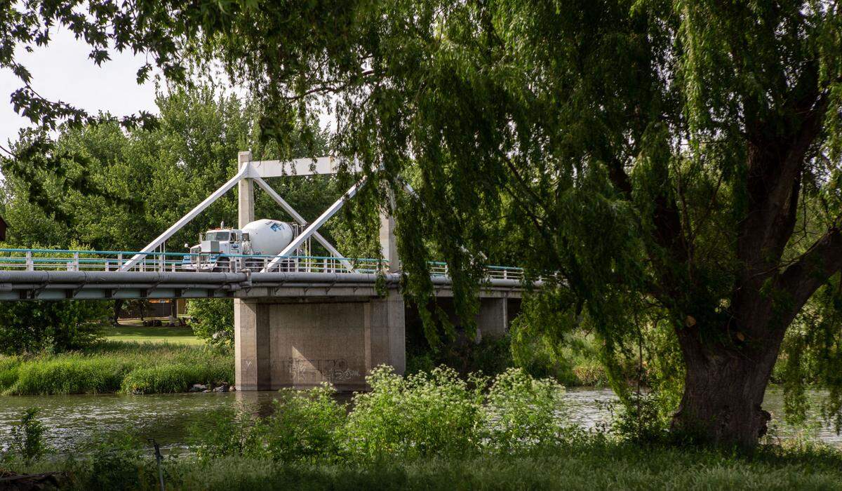 A cement truck passes over the Benton City - Kiona Bridge which spans the Yakima River in Benton City, Wash.