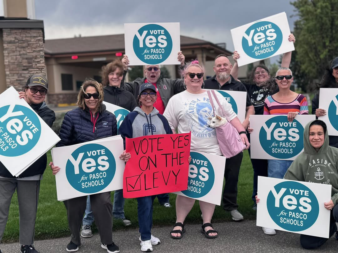 Unionized teachers with the Pasco Association of Educators campaigned Tuesday at Road 68 and Burden Boulevard to get out the vote for the school levy. Ballots are due Tuesday, April 28.