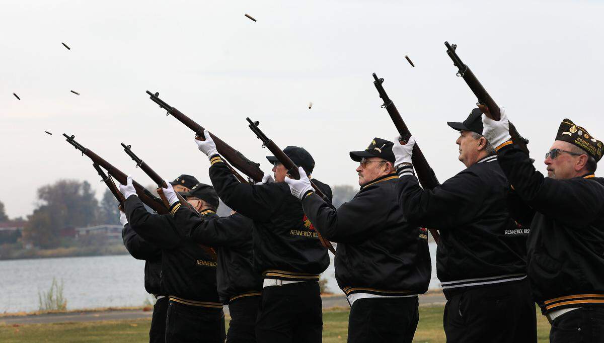 Members of the Kennewick VFW Post #5785 perform a traditional Three Volley Salute during Monday’s Veterans Day ceremony at the Regional Veterans Memorial in Kennewick’s Columbia Park.