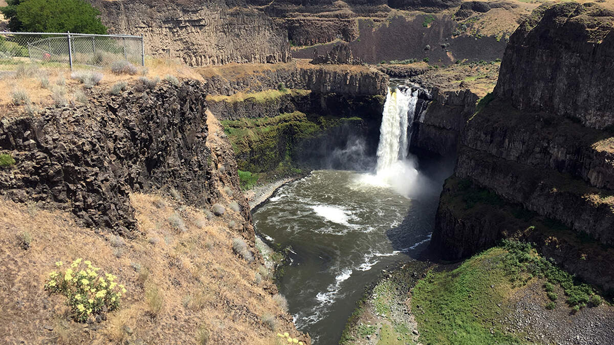 Falls drops into a deep gorge left from ice age floods at Palouse Falls State Park in Eastern Washington.