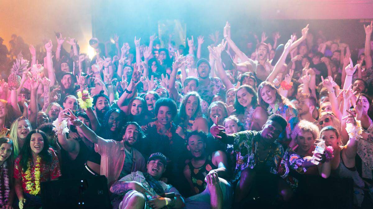 Richland rapper Karma, with fellow performers and the crowd at the sold out ‘Pineapple Island’ show July 14, 2018 at the Uptown Theatre in Richland.