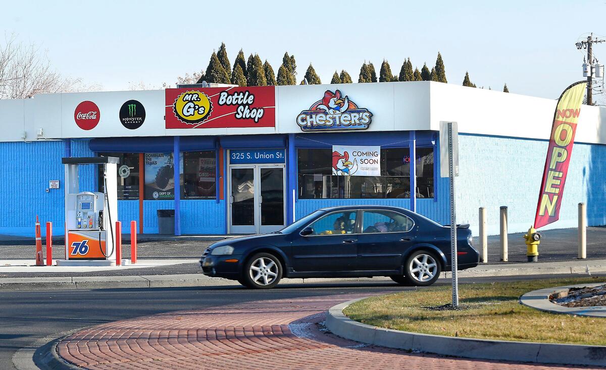 A sign for Chester’s fried chicken say’s it will be opening soon inside the revamped convenience store and gas station called Mr. G’s Bottle Shop at the intersection of West Fourth Avenue and South Union Street in Kennewick.