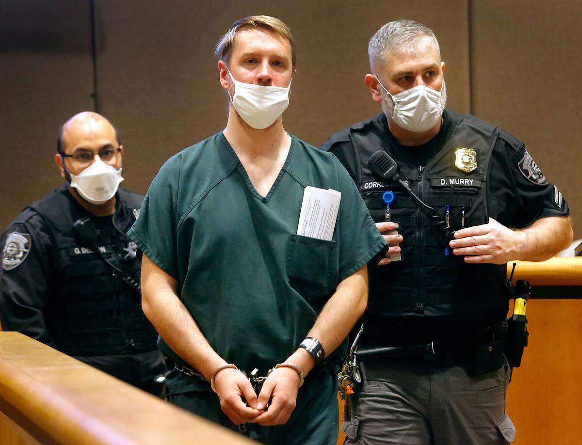 Aaron C. Kelly, 39, makes his first appearance Tuesday in Benton County Superior Court on charges he killed one and wounded another Monday inside the Richland Fred Meyer store.
