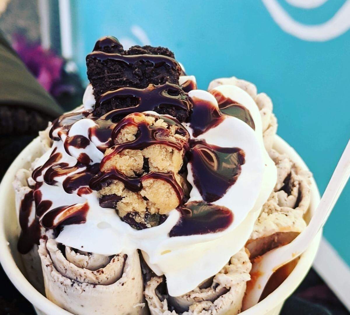 Red raspberry sauce tops this Galaxy Roll ice cream containing blackberries, oreo cookies and cheesecake at Rollin’.