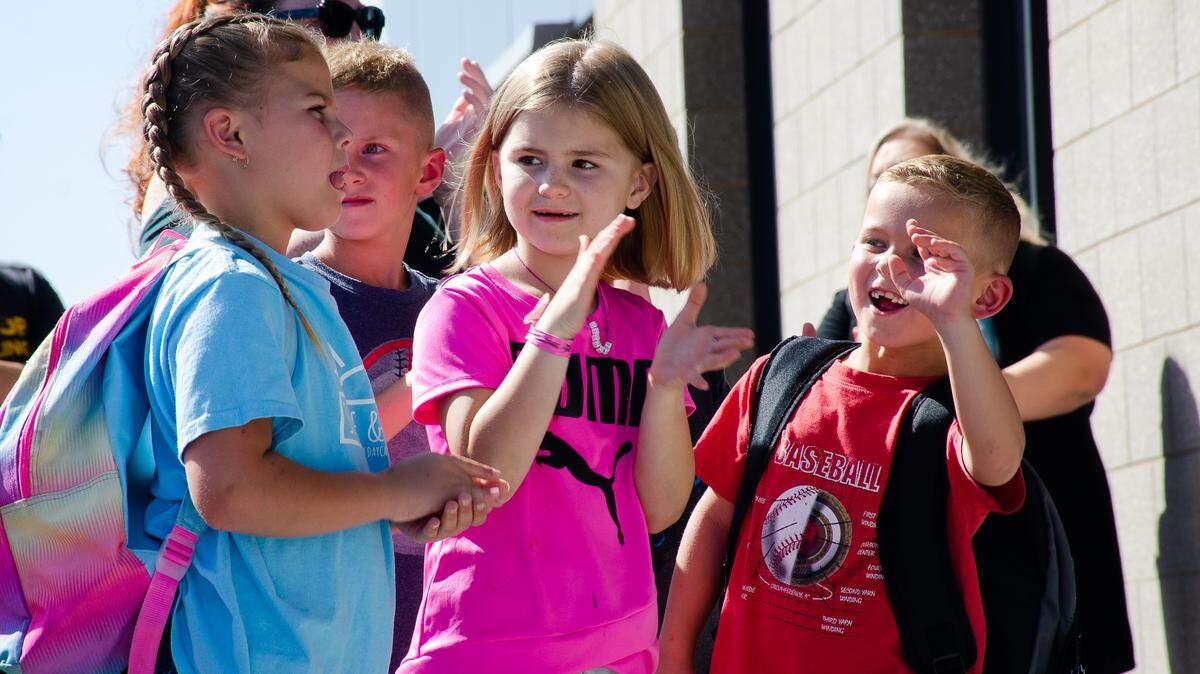 Students and families gather outside Desert Sky Elementary on Monday, Aug. 29, to celebrate a ribbon cutting marking the official opening of Richland School District’s 11th elementary school.