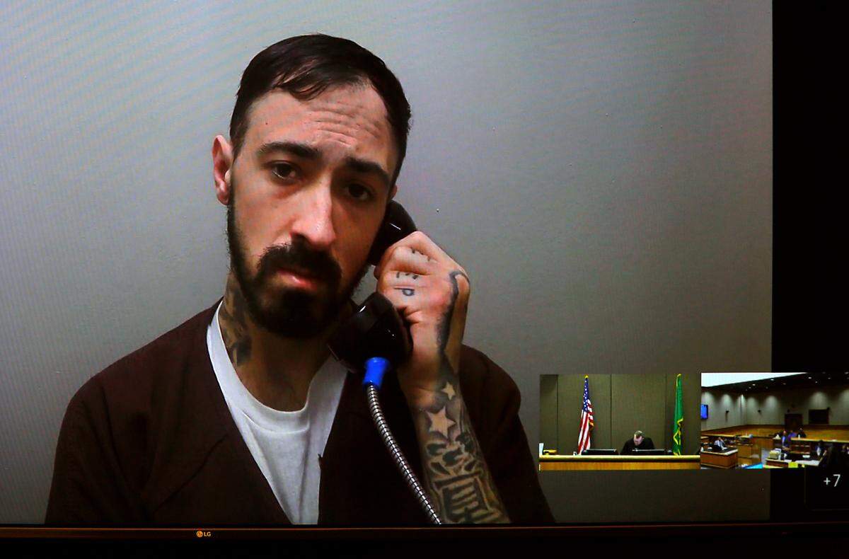 Michael T. Reep, 29, appears Wednesday in Benton County Superior Court via a video link from the Benton County Jail in Kennewick. He is being held in lieu of $1.1 million bail on two counts of illegally possessing a gun, three counts of hit-and-run and driving with a suspended license.