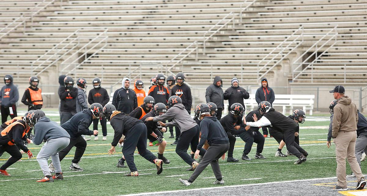 Kennewick High football players and their coaches practice at Lampson Stadium in Kennewick in this 2019 file photo.