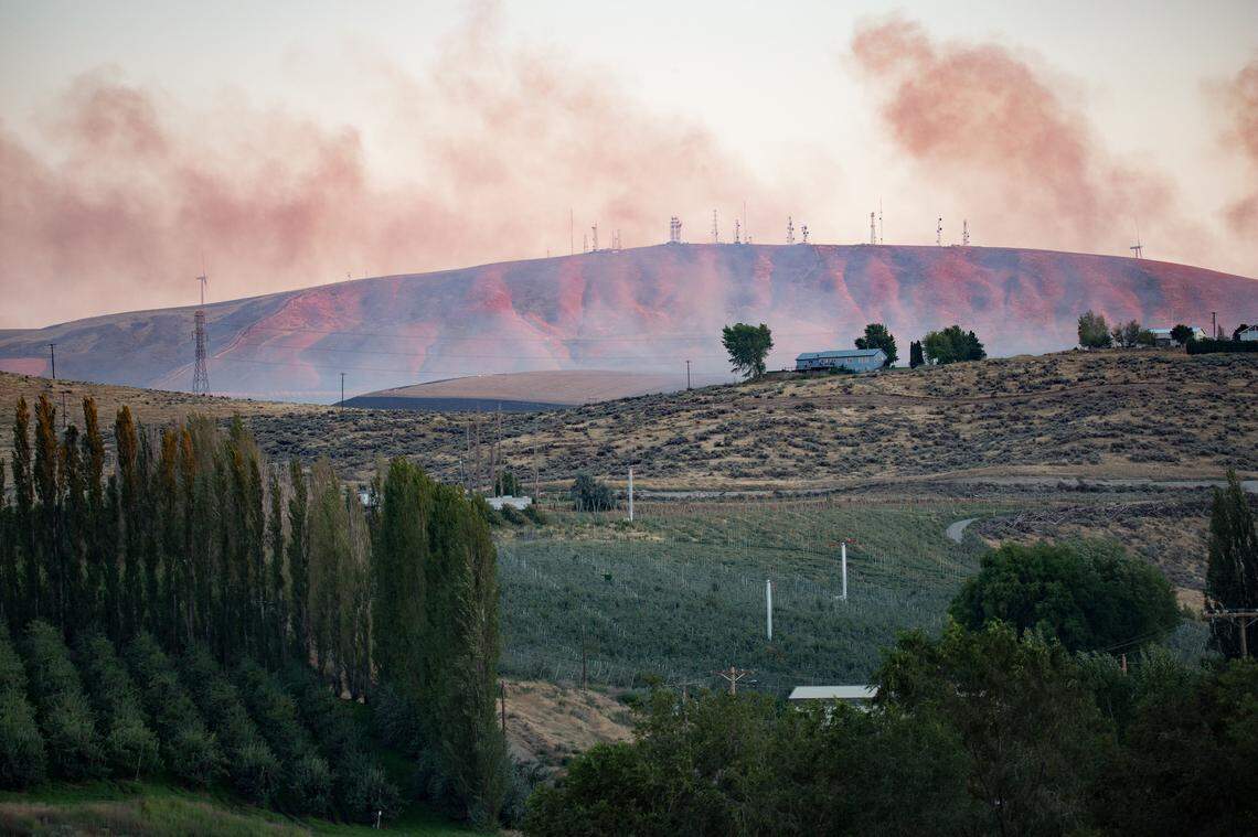 Firefighters worked through the night to stall the Bofer Canyon fire after it destroyed five homes in South Kennewick and threatened parts of Finley.