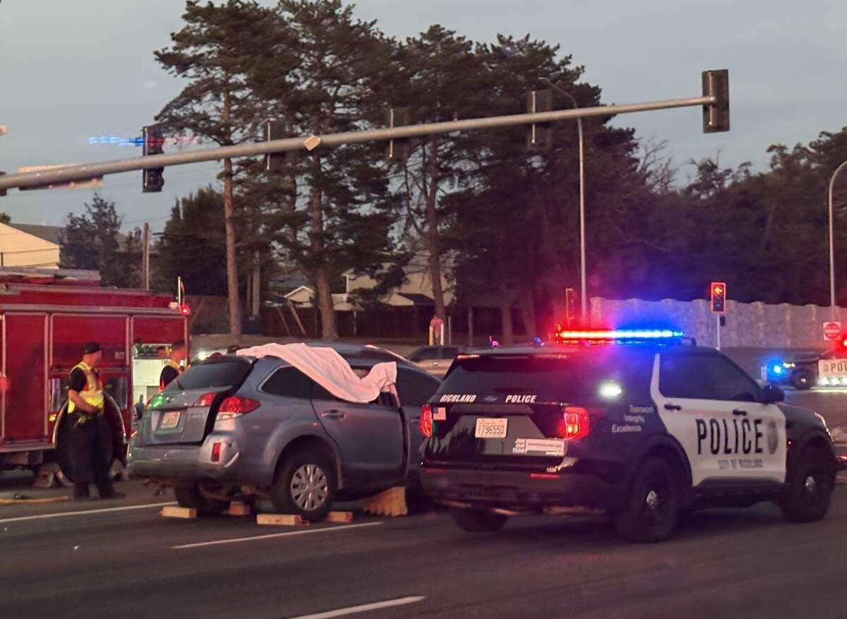 Richland police direct traffic around a fatal crash at Duportail Street and Highway 240 on Friday night.