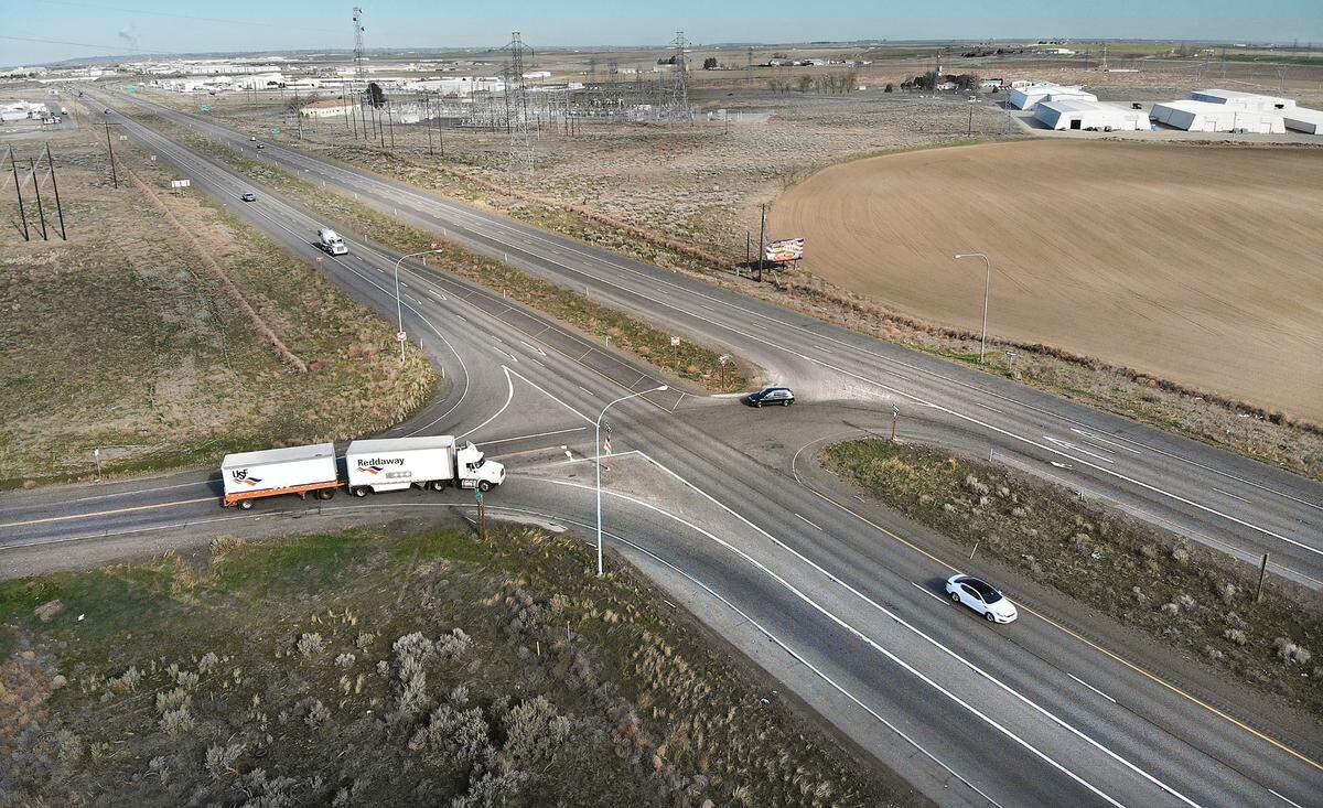 Traffic navigates the busy multiple lane intersection on Highway 12 at A Street in Pasco.