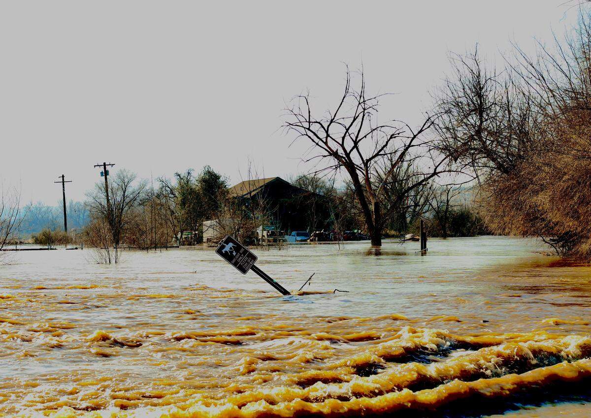 The Yakima River spilled over its banks in Richland on Saturday at a flood level not seen for 30 years.