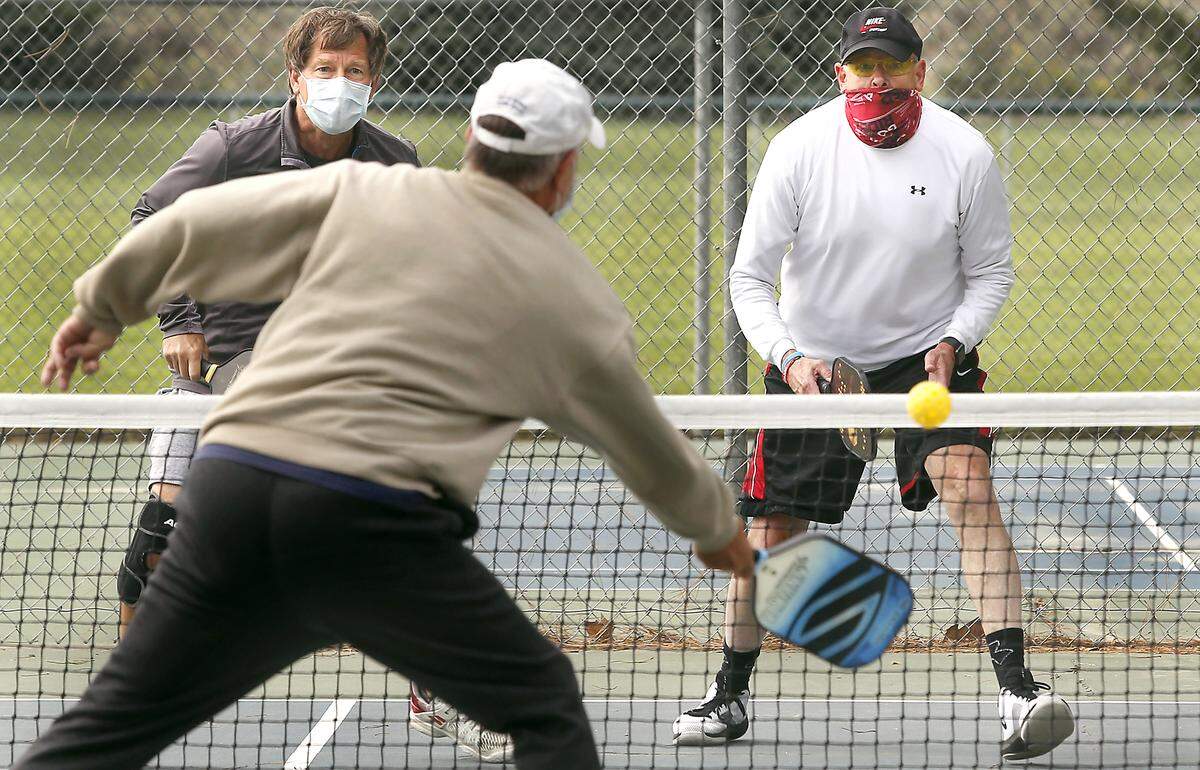 Pickleball grew in popularity during the COVID-19 pandemic. This game, with players wearing masks on the courts at Claybell Park in south Richland, was in 2020.