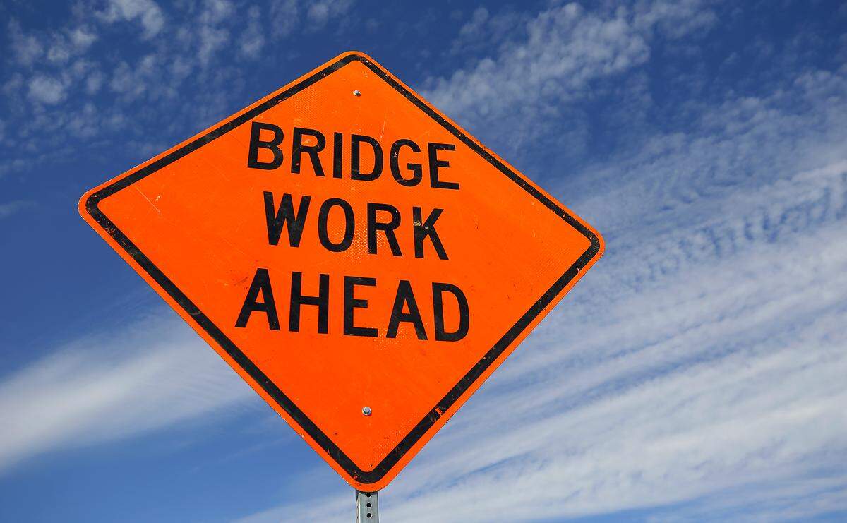 A sign posted near the intersection of South 1st Avenue and West Lewis Street warns drivers of the overnight repair work on the Lewis Street Overpass in downtown Pasco.