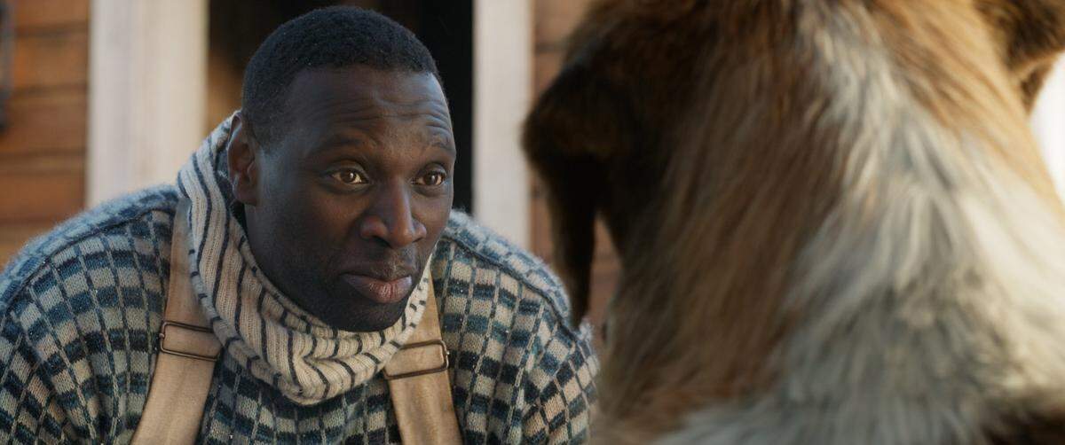 This undated image provided by 20th Century Fox shows actor Omar Sy in a scene from the film “Call of the Wild.” (20th Century Fox via AP)