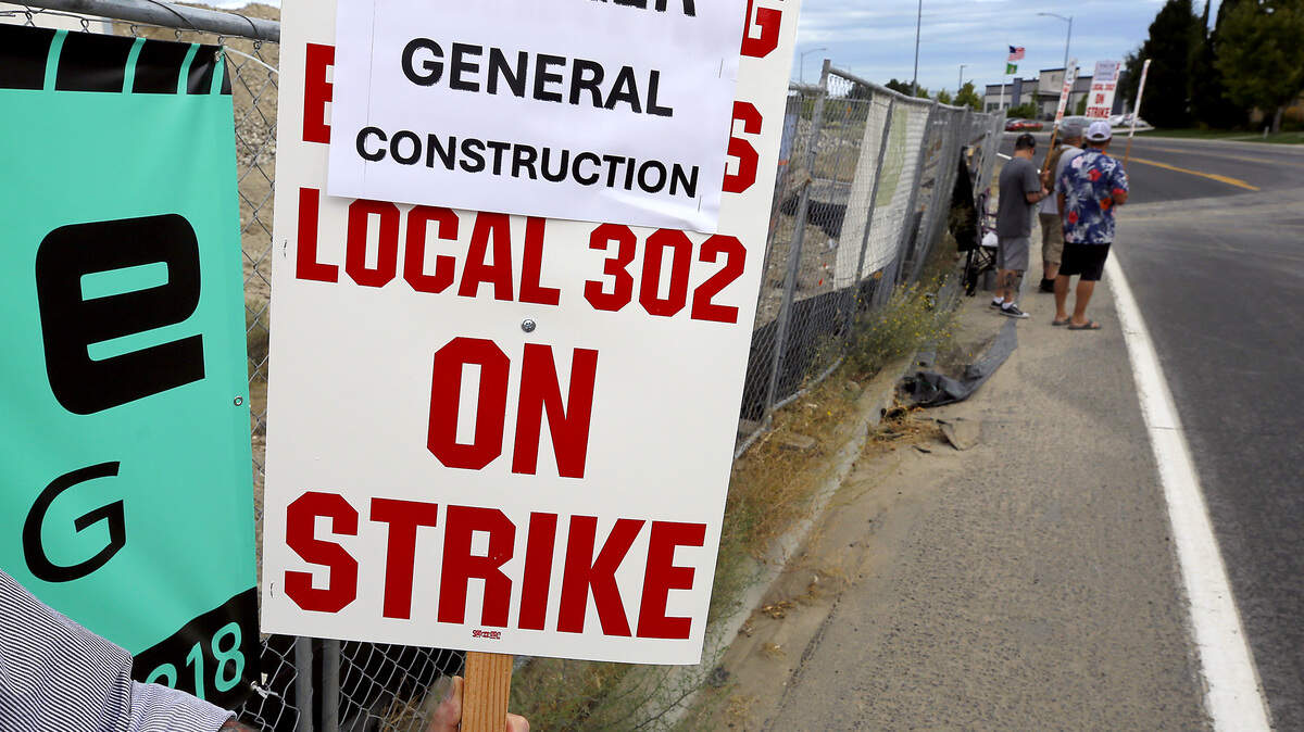 Construction sites across the Tri-Cities and Eastern Washington are still stopped or slowed as the International Union of Operating Engineers Local 302 continue to strike. These picketers were outside the construction projects Friday morning off Crosswind Boulevard in Kennewick. IUOE Local 302 represents heavy equipment operators who run excavators, cranes, bulldozers and other construction equipment.