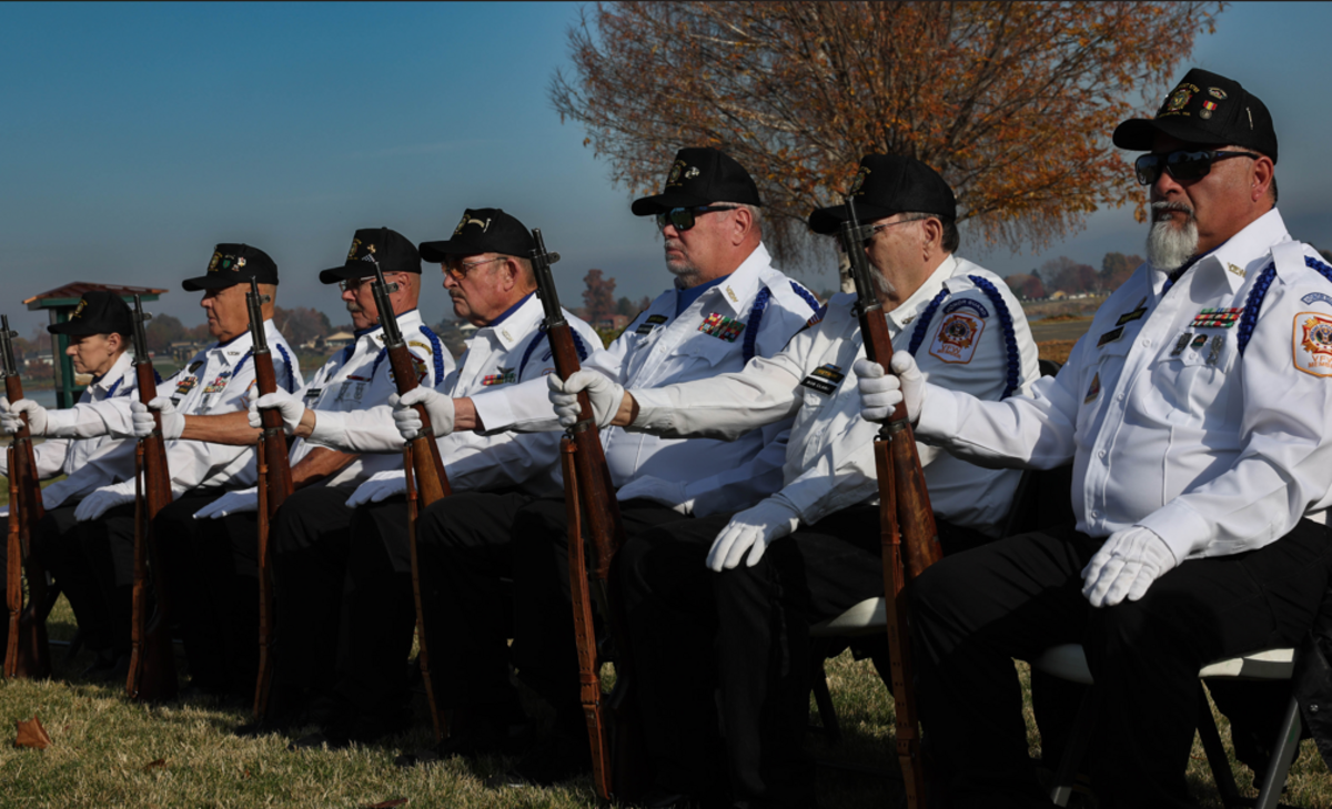 Members of Veterans of Foreign Wars Post 5785 in Kennewick prepare for the 21-gun salute during the Veterans Day ceremony.