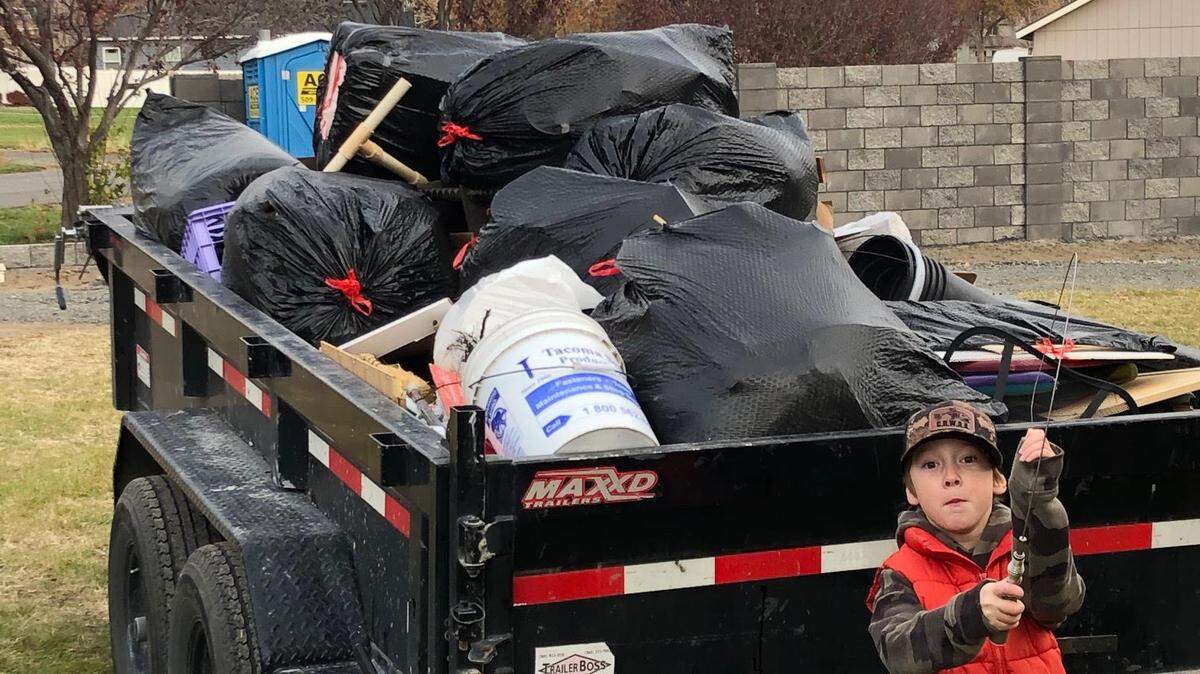 Lee Walter’s grandson, Colton, rescued a fishing pole before “stuff” went to the dump or Goodwill.