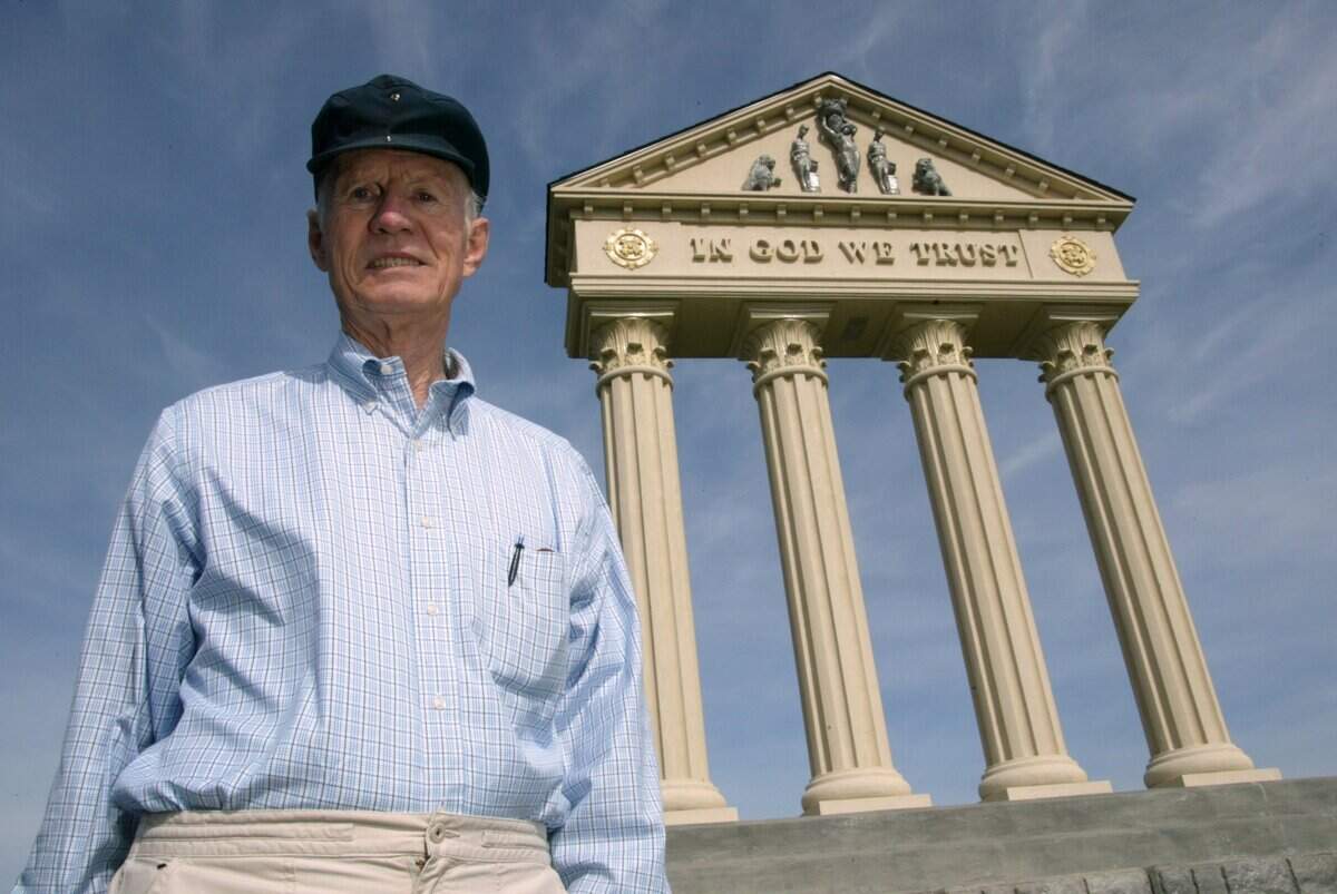 Milo Bauder stands near the entryway to Westcliffe, in south Richland, off Queensgate Drive., in 2004.