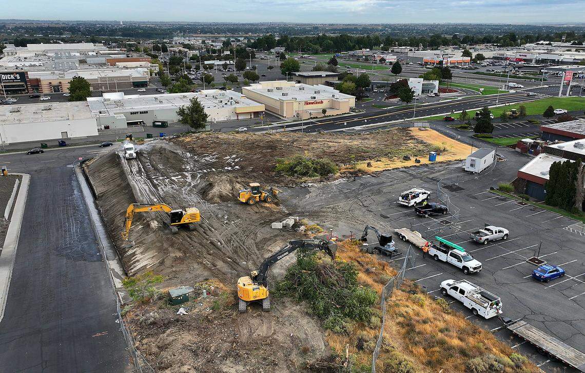 Heavy equipment has begin preparing the land  for a new four-story Holiday Inn hotel being built in Kennewick.