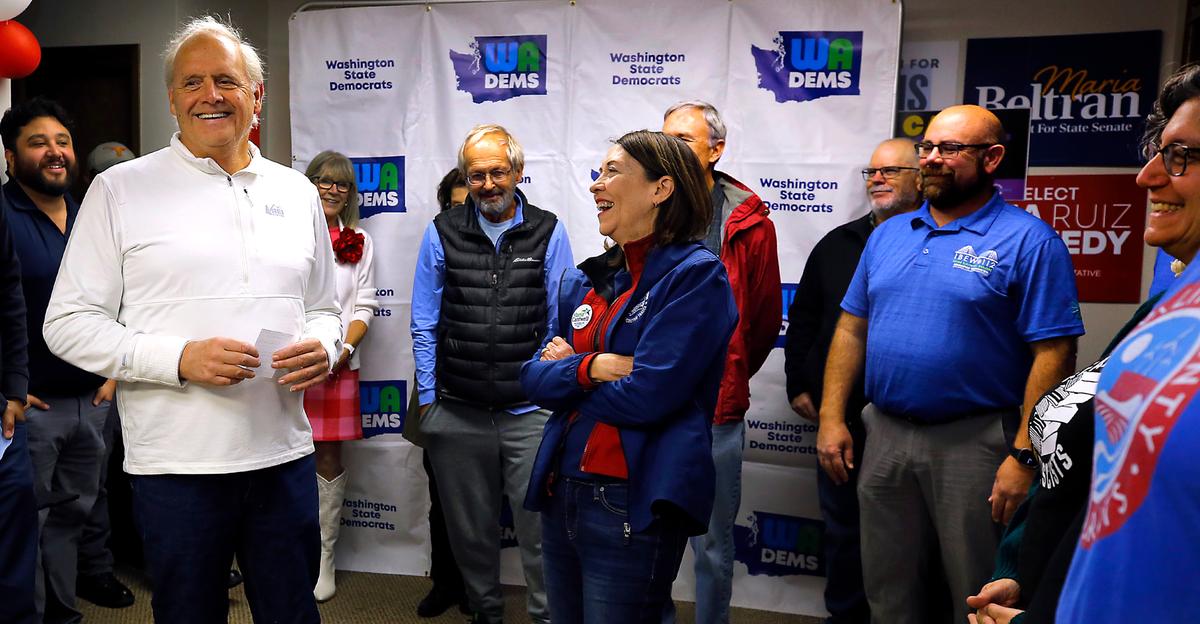 Andy Miller, retired Benton County prosecutor, shares a light moment with U.S. Sen. Maria Cantwell, D-Wash. during Friday’s Get Out The Vote Rally held by the Washington Democrats in Richland.