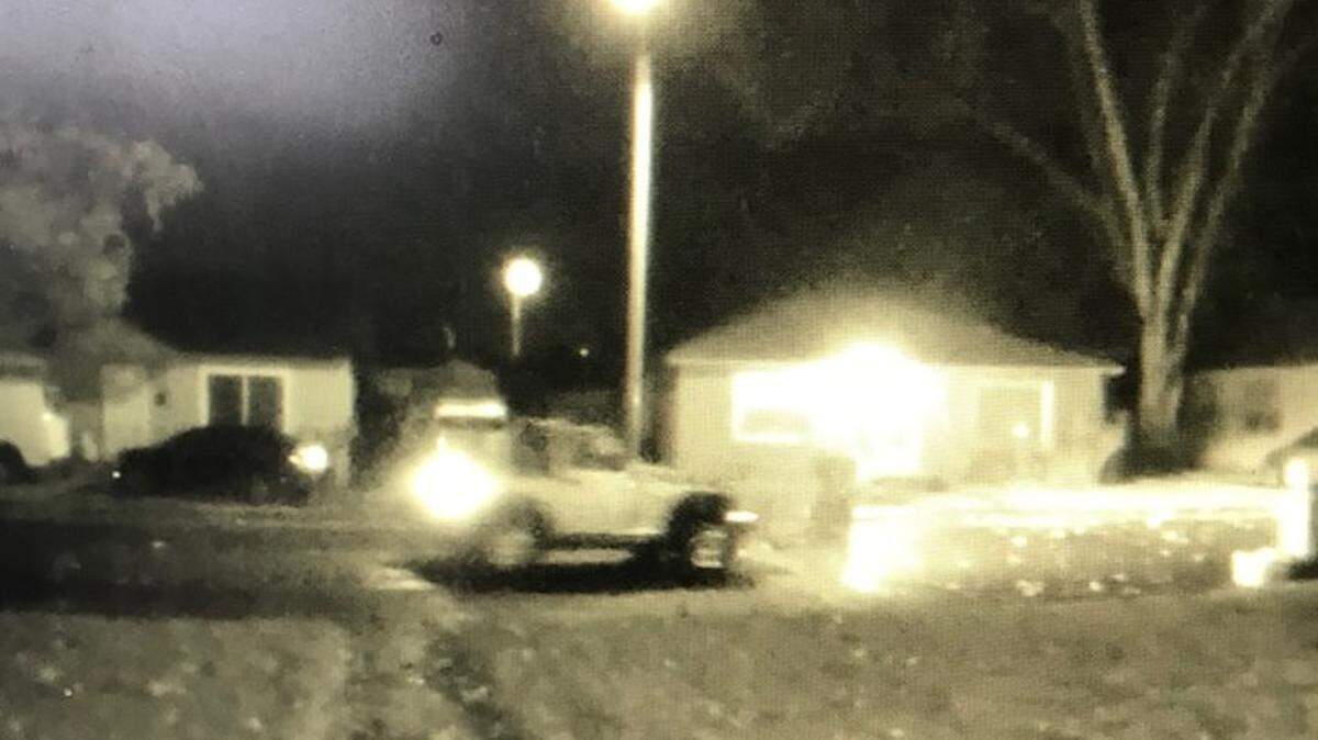 Two men rolled a motorcycle away from a home on West Third Avenue home early Wednesday and then set it on fire near Zintel Canyon.