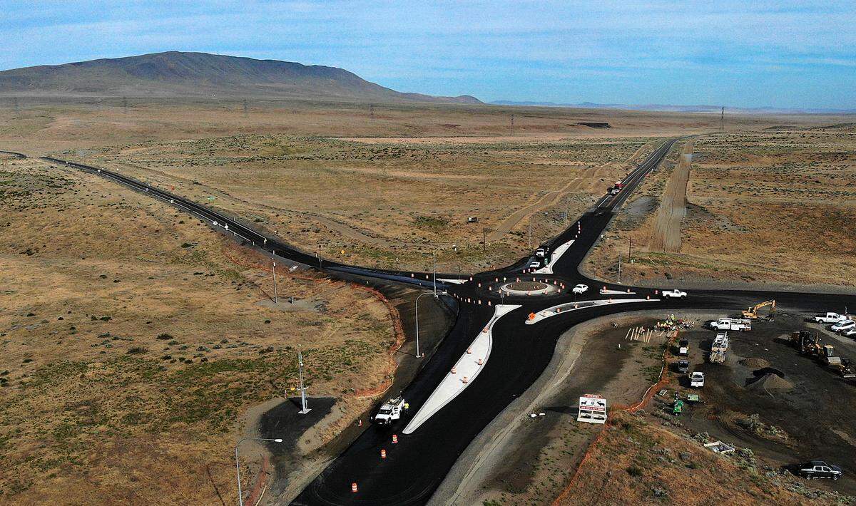 Drivers make their way through the partially-built roundabout at the intersection of Highway 240, Highway 225 and Hanford Route 10 Wednesday north of Richland.&nbsp;The lanes to Highway 225 and Route 10 will be close at 6 p.m. Thursday, June 7, and re-open at 4 a.m. on June 12.&nbsp;Highway 240 will remain open in both directions but will not have access to the Hanford site or Benton City, according to a Washington State Department of Transportation.