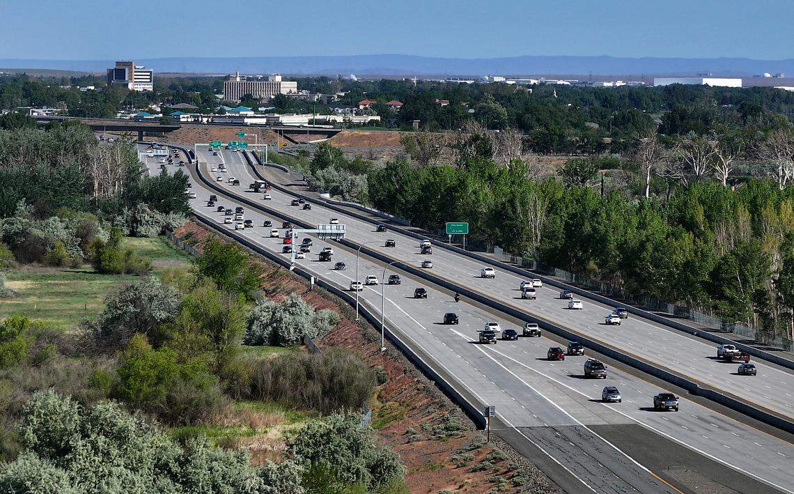 Highway 240 causeway past the Yakima River Delta looking toward Richland and Hanford.