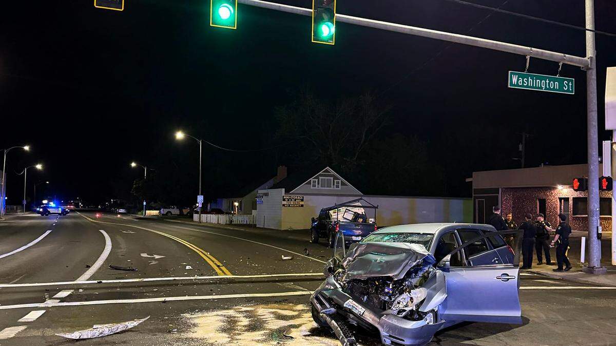 A 29-year-old alleged intoxicated driver was speeding when he ran a red light and crashed into a pickup in Kennewick.
