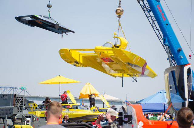 Cranes lift hydroplanes out of the water at the 2024 Water Follies Apollo Columbia Cup.