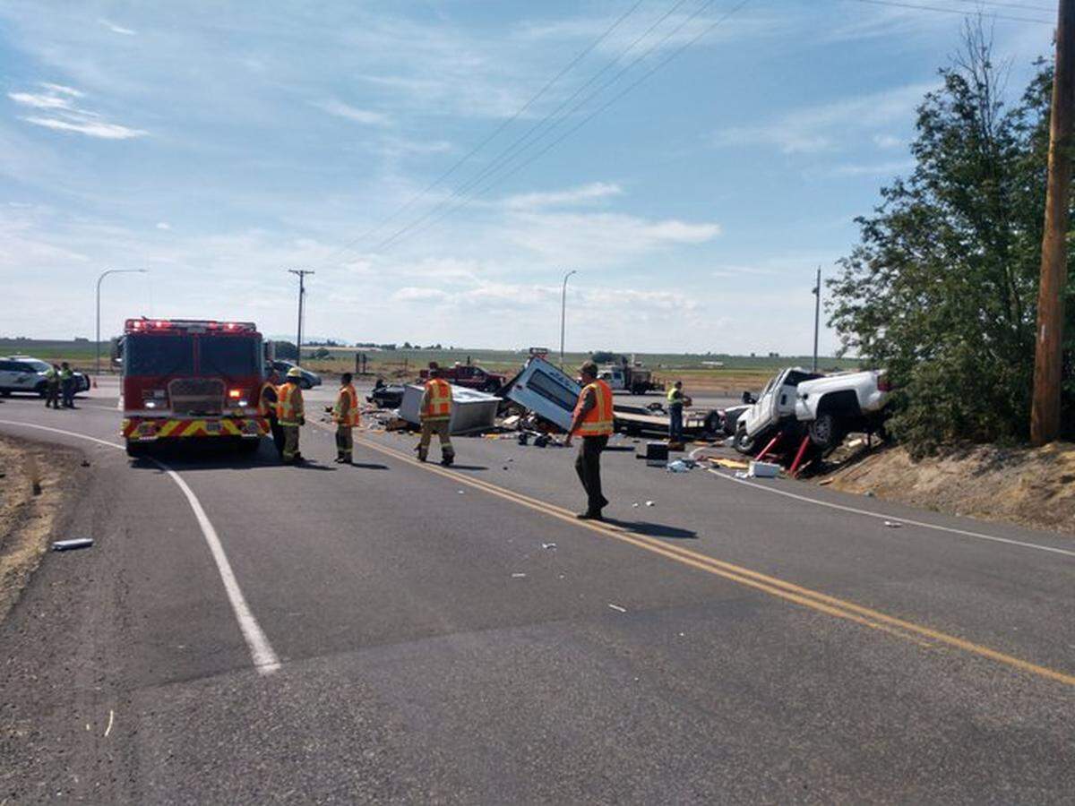 Two people died in this two truck collision Tuesday on Highway 395 just north of Pasco.