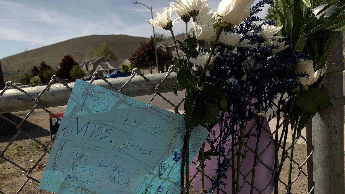 Flowers were placed at William Wiley Elementary School in West Richland, Wash., after paraeducator Amber M. Rodriguez was shot outside the school.
