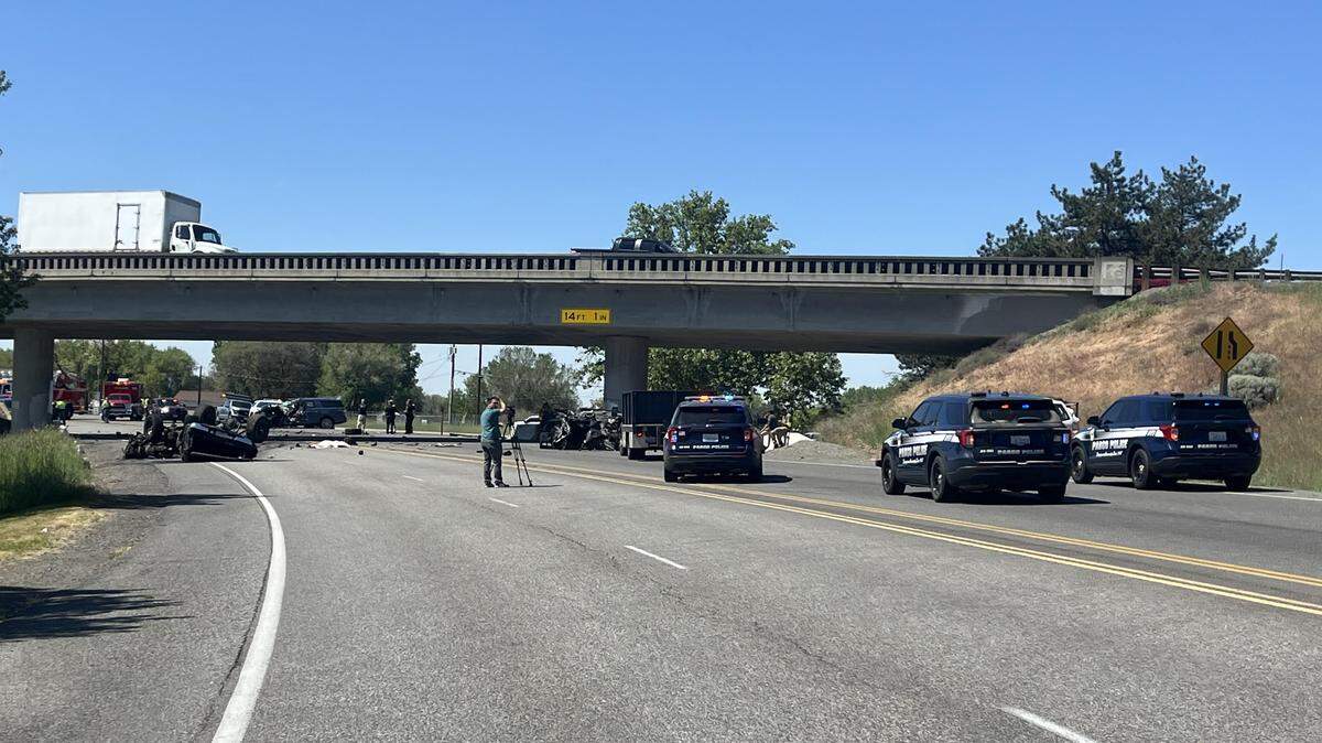 Two people are dead in a crash on the Lewis Street ramp from Highway 395.