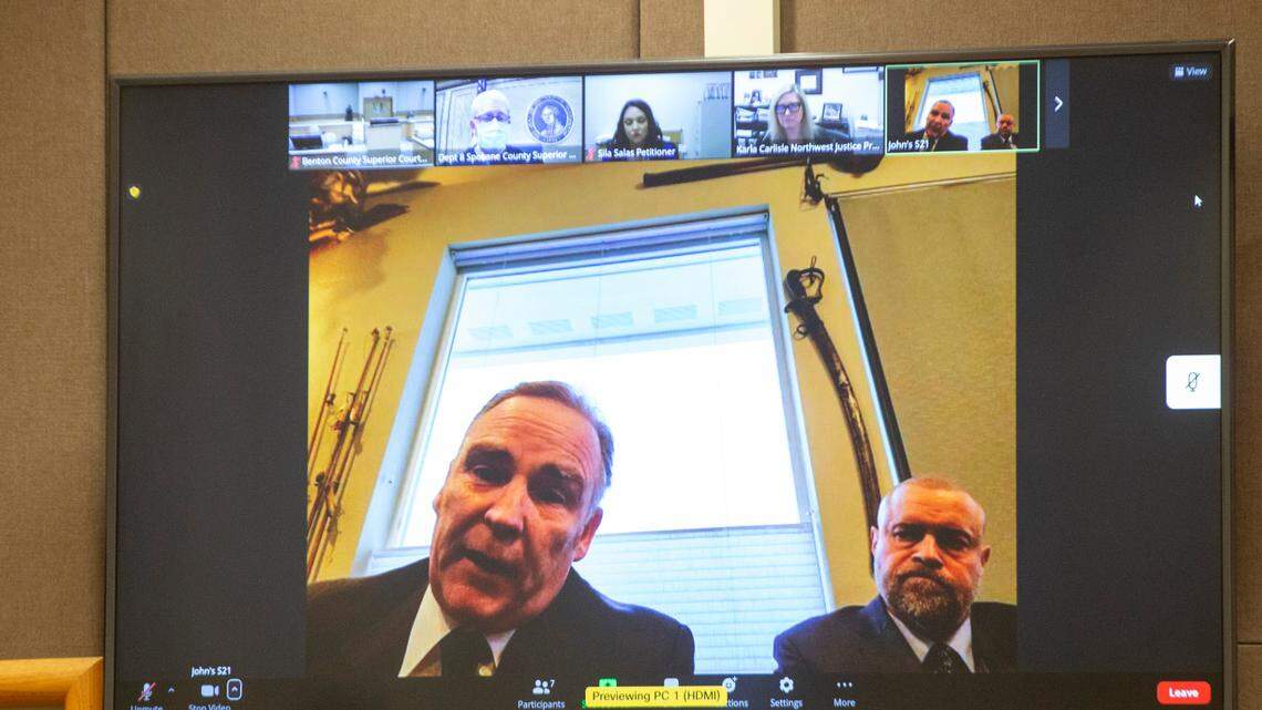 Judge Sam Swanberg, right, appeared for a virtual hearing this week with attorney John Jensen. Swanberg with Benton-Franklin Superior Court agreed to a modified no-contact order that allows him to preside over cases at the Benton County Justice Center, where his ex-girlfriend also works.