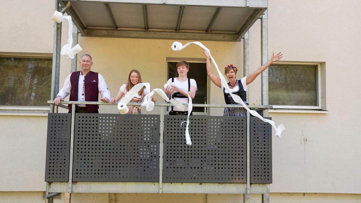 The LaRosa family (Ed, Hailey, Hunter and Traci) throw caution to the wind during the Stay at Home command on their U.S. military base in Germany. The photo opportunity was part of The Front Porch Project during the COVID-19 pandemic.