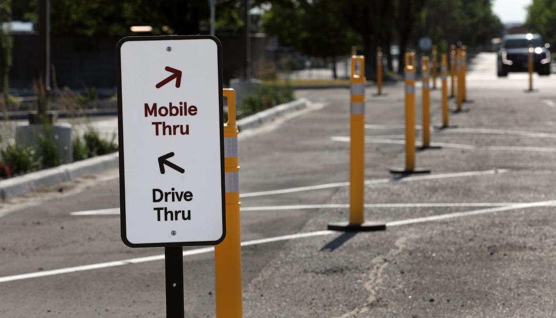 Customer traffic control signs are in place in the parking lot of the new Kennewick Chick-fil-A at 7009 W. Canal Drive.