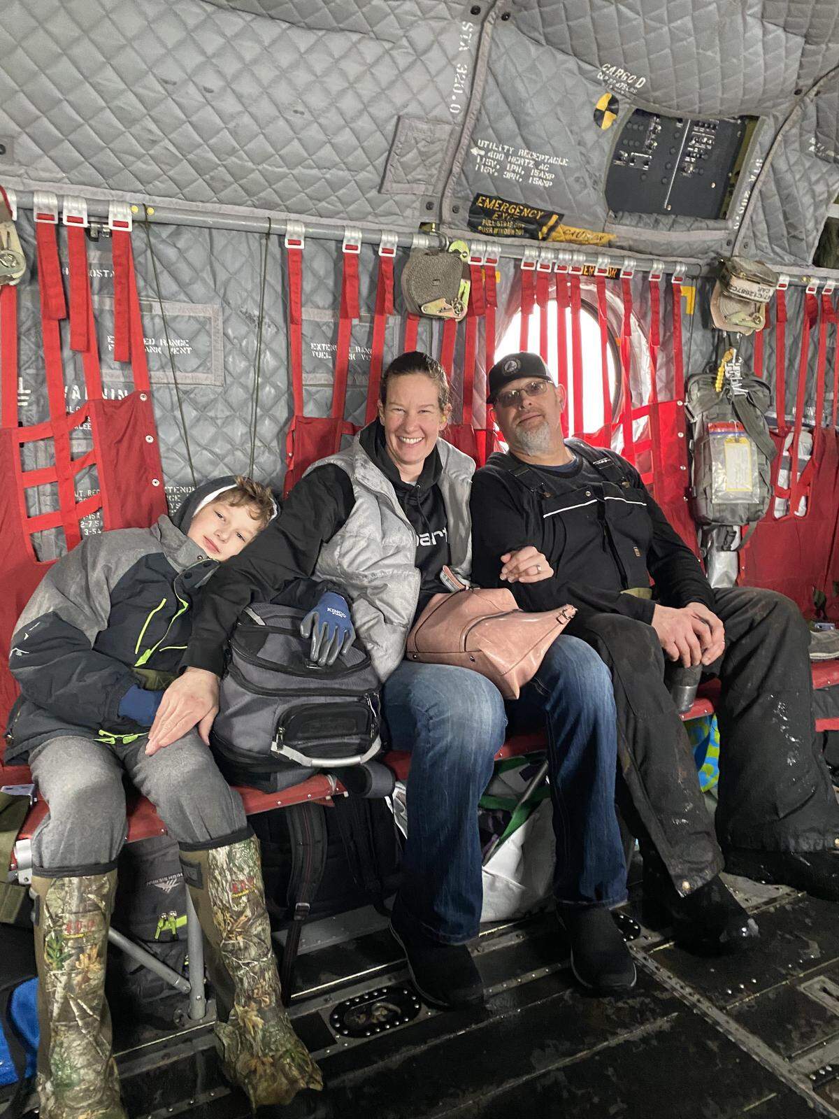 Mike and Michelle Stempson and McCauley, 8, were evacuated from the flooded Bar M Ranch by Oregon Army National Guard helicopter.