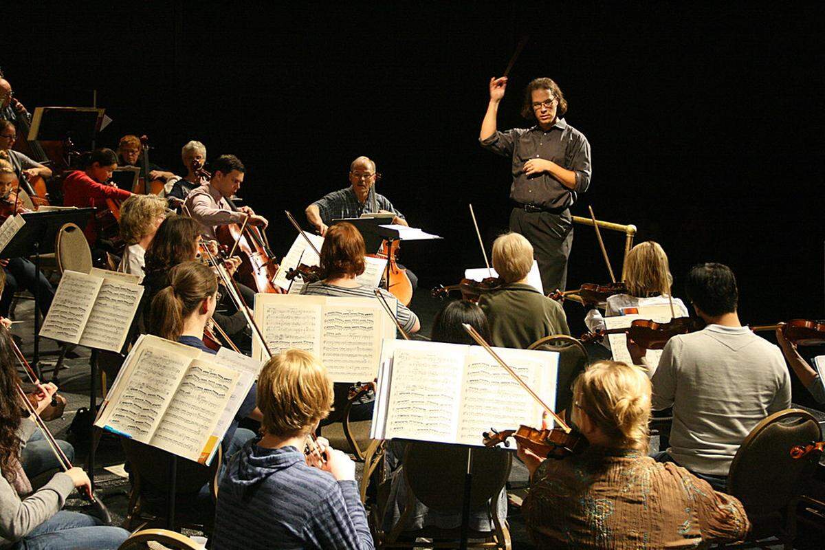 Conductor Nick Wallin puts the Mid-Columbia Symphony through its paces during a 2012 rehearsal.