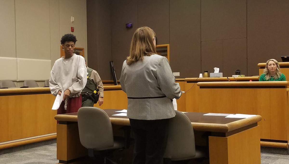Stuart Walker, the 17-year-old accused of killing Patrick Romero, is walking up to the defense table Friday. He made his first appearance in Benton County Superior Court and is currently being held on $1 million bail.