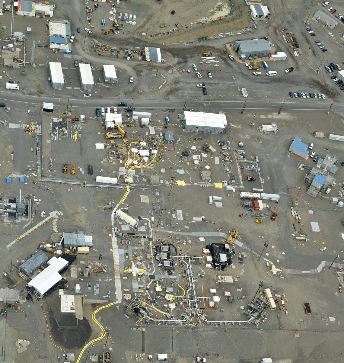 An aerial view of the AX Tank Farm at Hanford shows some of the infrastructure installed to start retrieving radioactive waste from the underground tanks there.