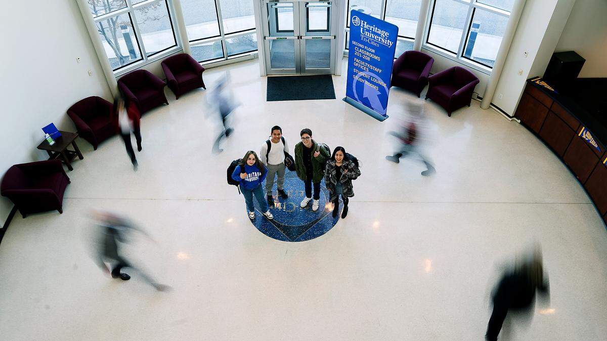 Heritage University is now a tenant in the former Tri-City Herald building in downtown Kennewick. The four students are, from left to right: Viviana Aguilar, Johny Sleider Turciog Garcia, Eldrick Knapp, Noemi Mendoza Santiago.