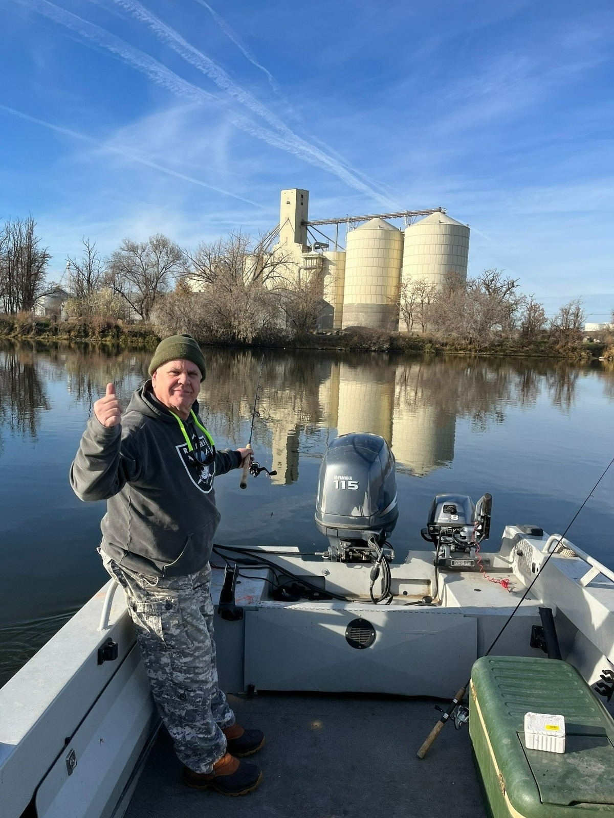 Tim Hilsen gives a thumbs up, one of many non-verbal signals fishing buddies use to communicate their satisfaction with a day on the water.