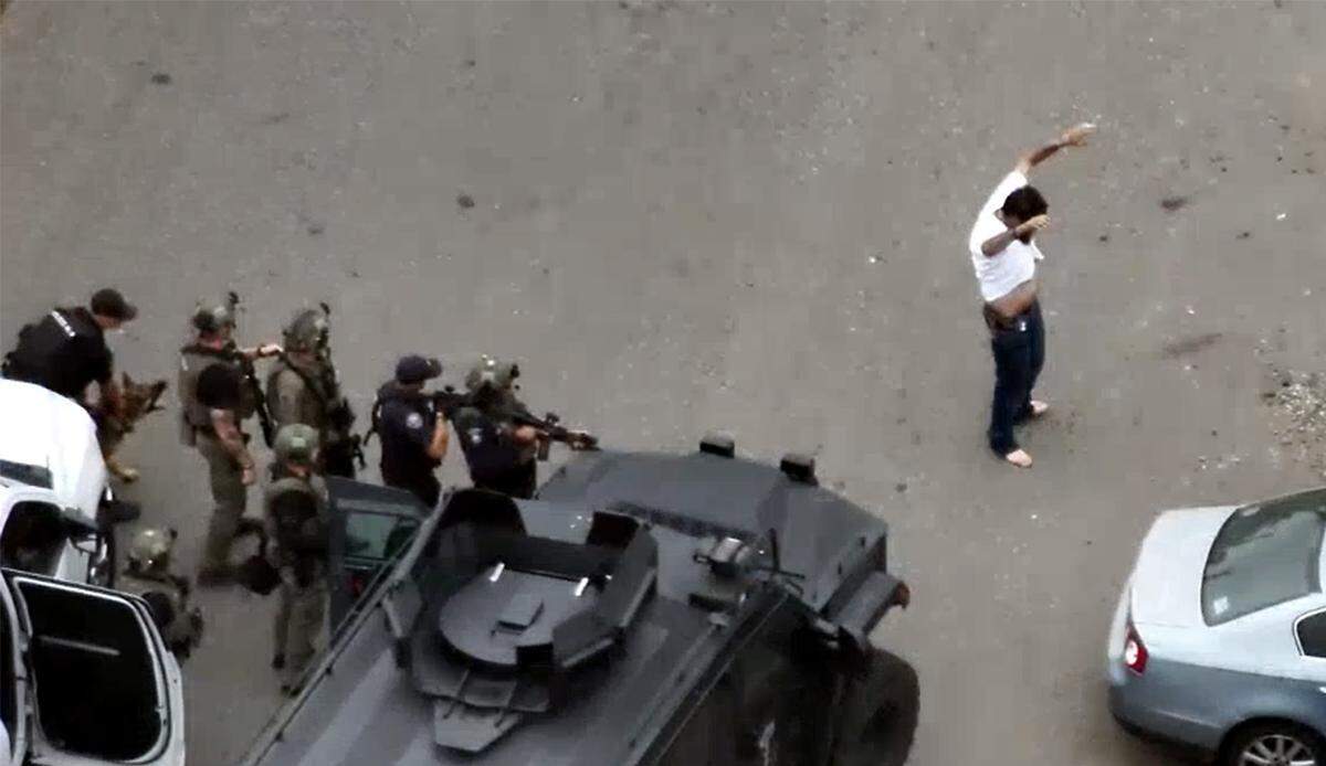 The Tri-Cities Regional SWAT team and Kennewick and Richland officers arrested robbery suspects Mark Barnett and Matthew Miller after searching an apartment in Kennewick and a Richland home.