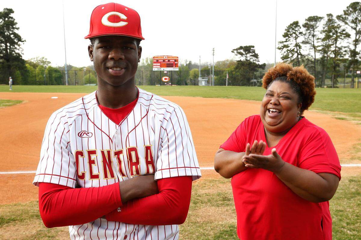 Clarke Central's Rio Foster poses for a photo with his super fan mom Iris Cleveland before a high school baseball game. (Photo/Joshua L. Jones, Athens Banner-Herald) News Joshua L Jones