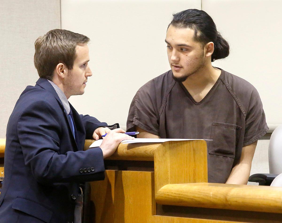 Prosser shooting suspect Isaiah M. Colley, 19, talks with his provisional defense attorney Michael Vander Sys before the start of a hearing Friday in Benton County Superior Court in Kennewick. Colley is one two men accused in the shooting incident early Monday morning at a Prosser apartment complex. Watch a video: tricityherald.com/video