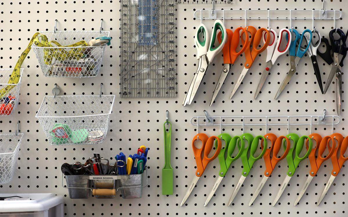Sewing equipment and supplies are stored on a pegboard wall at Jessica's Sewing School, 3030 W. Clearwater Ave., suite 110, in Kennewick.