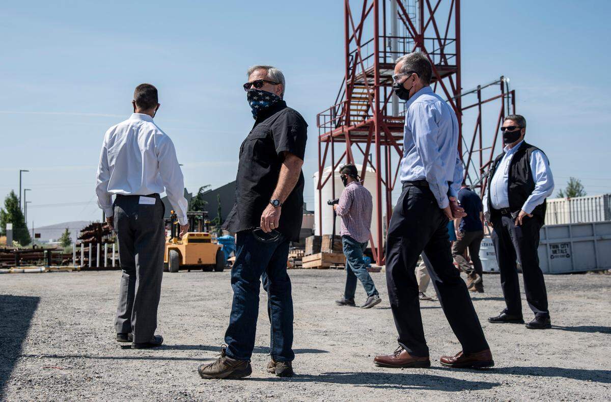 U.S. Energy Secretary Dan Brouillette, center, tours a Richland plant fabricating a system to pretreat waste for the $17 billion waste vitrification plant that will glassify millions of gallons of radioactive waste stored in underground tanks.