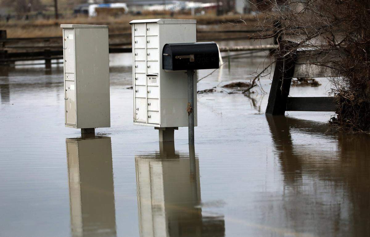 Mailboxes on Kingston Road off Van Giesen Street in Richland are surrounded by floodwaters in December 2025.